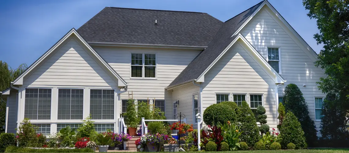 Professional property valuer assessing the value of a home